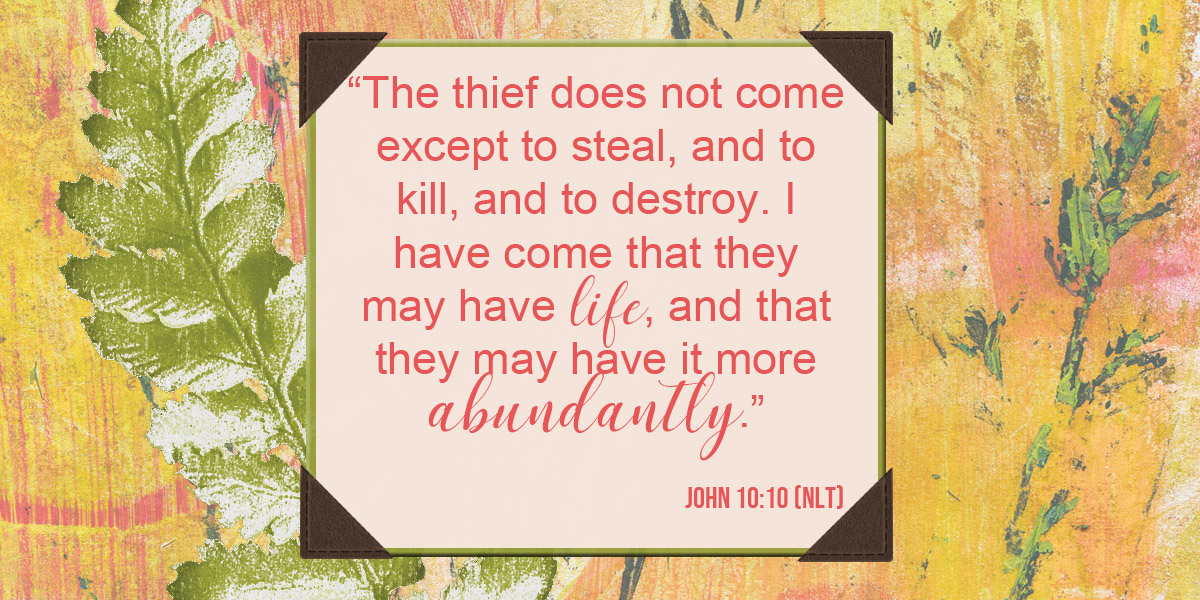 John 10:10 NKJV written on a spring background.